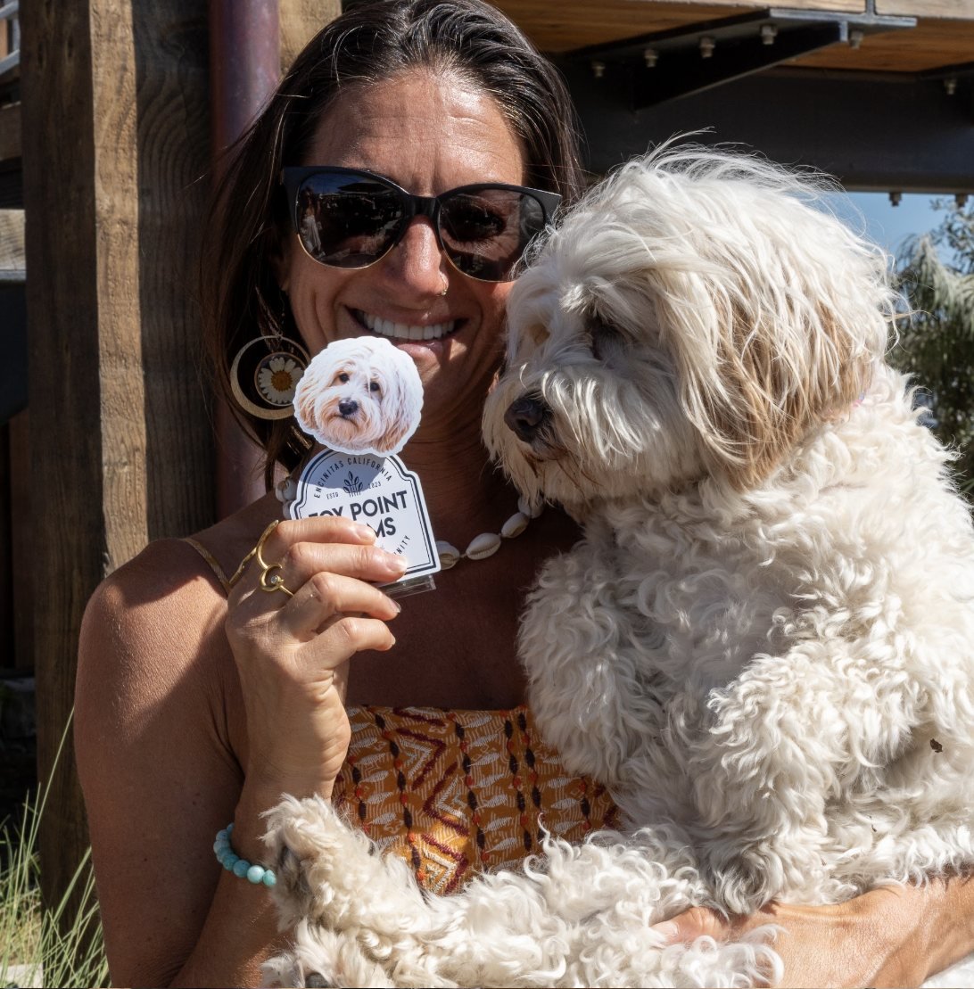 Guest and her dog with a personalized TinyTwin of the dog