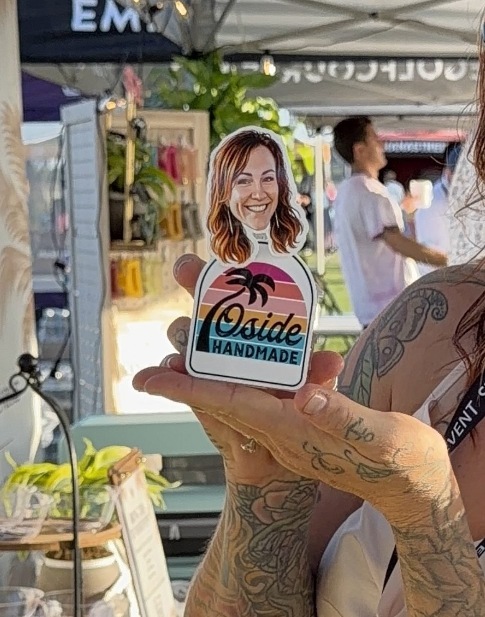 Personalized TinyTwin with a custom branded base at an outdoor market event